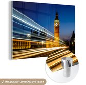 MuchoWow® Glasschilderij 90x60 cm - Schilderij acrylglas - De Big Ben met een lichtstraal in Londen - Foto op glas - Schilderijen