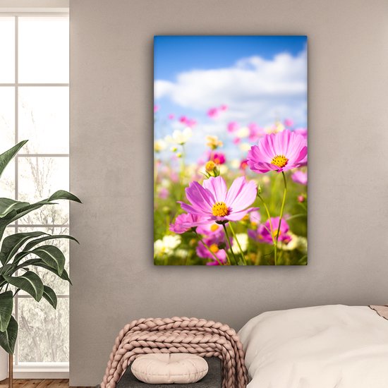 Canvas schilderij 90x140 cm - Wanddecoratie Bloemen - Wei - Paars - Gras - Wit - Wolken - Blauw - Muurdecoratie woonkamer - Slaapkamer decoratie - Kamer accessoires - Schilderijen op canvas