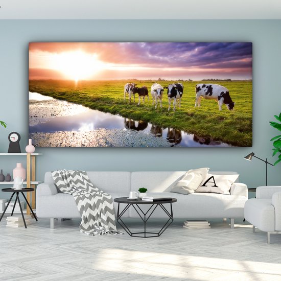 Tableau sur toile Vaches pendant un coucher de soleil - 160x80 cm - Décoration murale Art