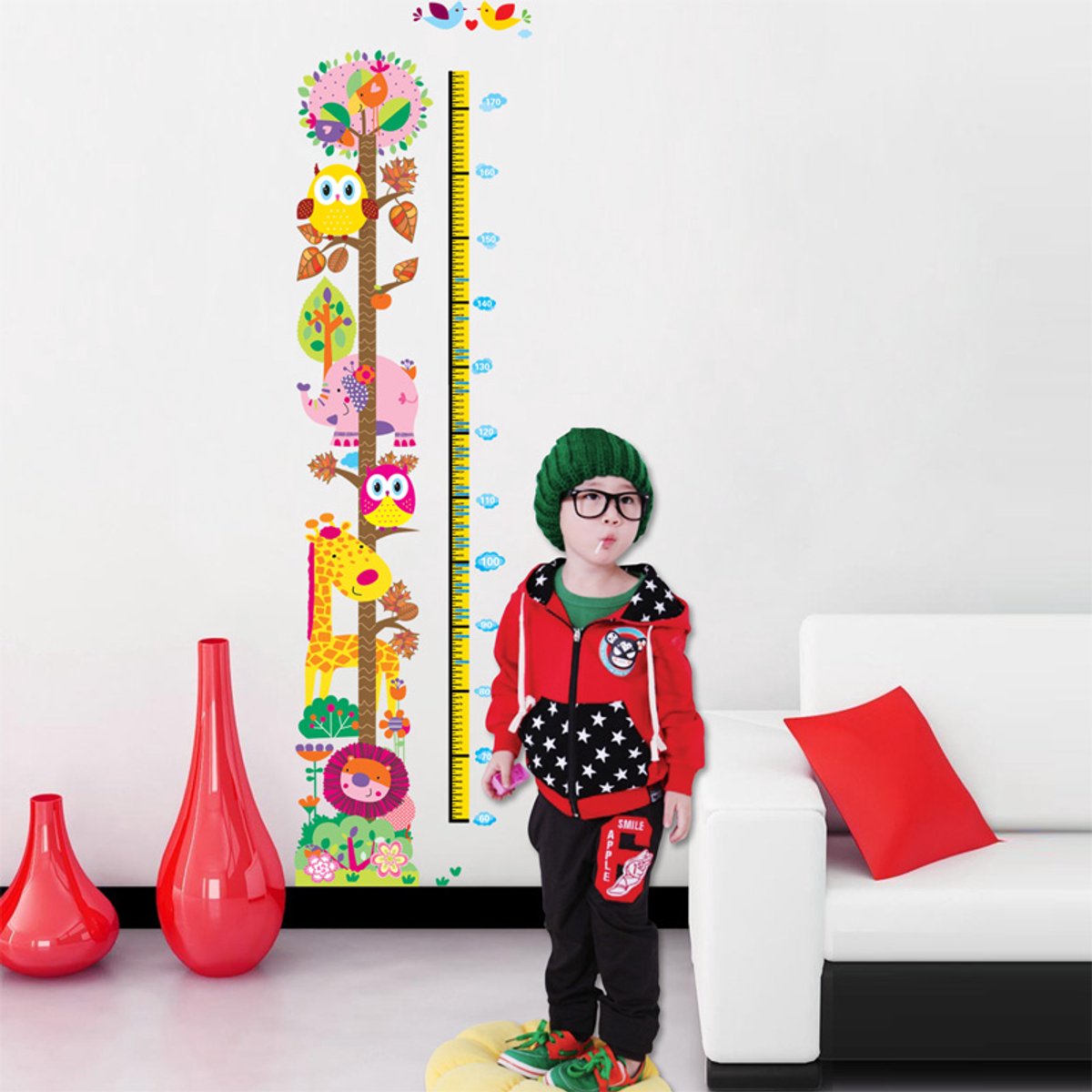 Muurstickers, decoratieve zelfklevende groeimeter met uilen en giraffen.