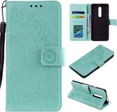 Voor Nokia 2.4 Totem Bloem Reliëf Horizontale Flip TPU + PU lederen tas met houder & kaartsleuven & portemonnee (groen)