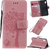 Tree & Cat Pattern Pressed Printing Horizontale Flip PU lederen tas met houder & kaartsleuven & portemonnee & lanyard voor Galaxy A10e (roze)