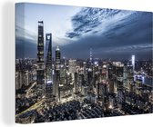 Canvas Schilderij Skyline Financiële District van Shanghai - 30x20 cm - Wanddecoratie