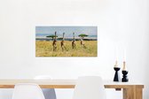 Canvas Schilderij Giraffen in het Masai Mara National Park in Kenia - 60x40 cm - Wanddecoratie