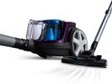 Aspirateur violet Philips PowerPro Compact avec bac à poussière transparent et embout d'aspiration noir.