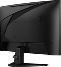 Achterkant van een zwarte gebogen gaming monitor met MSI logo.