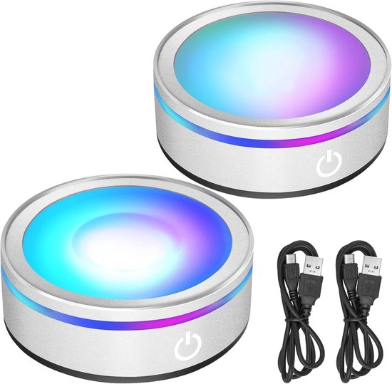 Deux bases lumineuses rondes argentées avec interrupteur tactile et câbles USB.