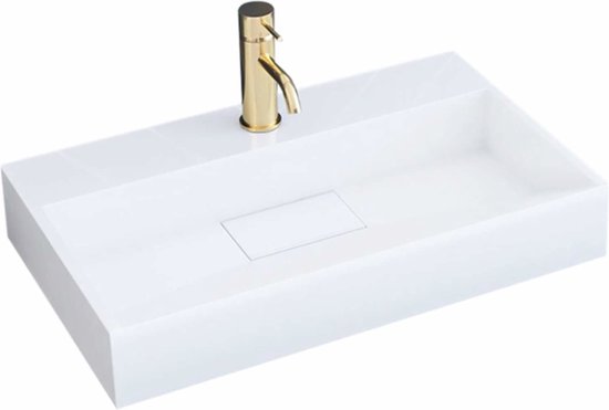 Lavabo à poser rectangulaire blanc et minimaliste avec un robinet doré, isolé sur fond blanc.