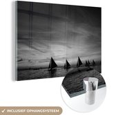 MuchoWow® Glasschilderij 30x20 cm - Schilderij acrylglas - Zeilboten voor de kust van Boracay - zwart wit - Foto op glas - Schilderijen