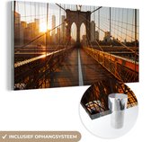 MuchoWow® Glasschilderij 160x80 cm - Schilderij acrylglas - Brooklyn Bridge in New York tijdens zonsondergang - Foto op glas - Schilderijen