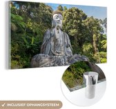 MuchoWow - Glasschilderij - Foto op glas - Acrylglas - Boeddha beeld - Natuur - Boom - Schilderij glas - Glasschilderij binnen - 120x60 cm - Muurdecoratie - Wanddecoratie woonkamer