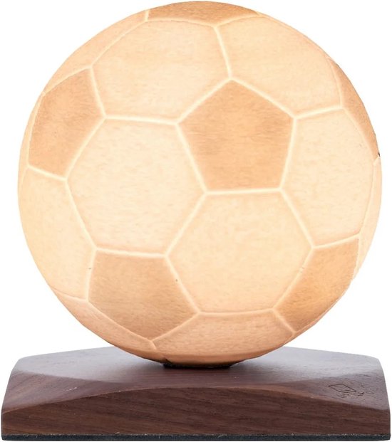 Lampe de football sur un support en bois
