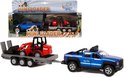 Een blauwe pick-uptruck met een grijze aanhanger, waarop een rode minishovel staat.