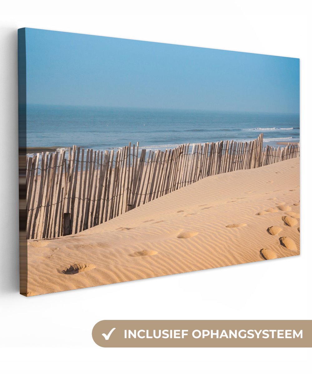 Canvas schilderij 150x100 cm - Wanddecoratie Strand - Palen - Zee - Muurdecoratie woonkame