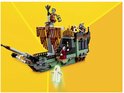 Un bateau fantôme vert avec des figurines de zombies, vampires et fantômes.