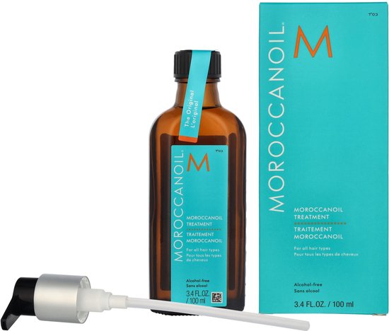 Amberkleurige fles met blauw label "MOROCCANOIL" en doos. Inclusief pompdispenser.