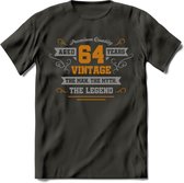 64 Jaar Legend T-Shirt | Goud - Zilver | Grappig Verjaardag Cadeau | Dames - Heren | - Donker Grijs - L