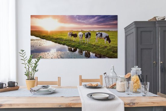 Tableau sur toile Vaches pendant un coucher de soleil - 160x80 cm - Décoration murale Art