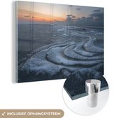 MuchoWow® Glasschilderij 120x80 cm - Schilderij acrylglas - Schuimende zee tijdens zonsopkomst - Foto op glas - Schilderijen