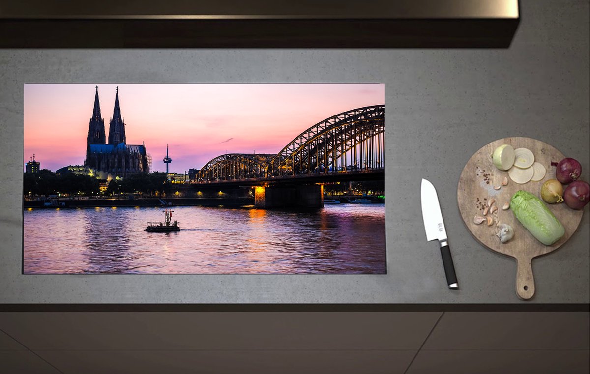Inductieplaat Beschermer - Uitzicht op de Dom en Brug van Keulen tijdens de Avondzon in Duitsland - 90x52 cm - 2 mm Dik - Inductie Beschermer van Vinyl