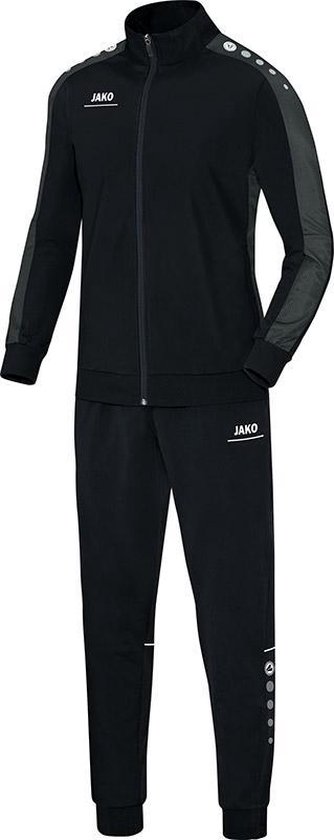 Zwarte JAKO trainingsset voor heren: trainingsjas met grijze mouwpanelen en trainingsbroek met stippen.