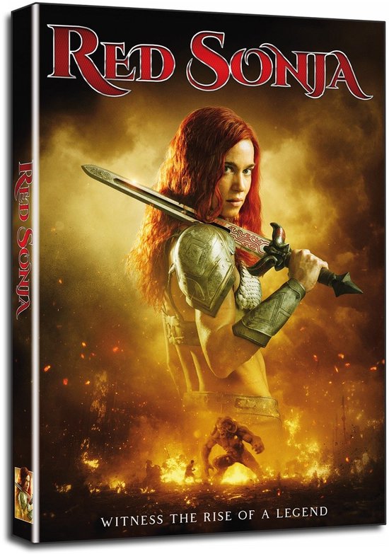 DVD-hoes Red Sonja met rood haar, zwaard in de hand, omringd door vuur. Tekst: WITNESS THE RISE OF A LEGEND.