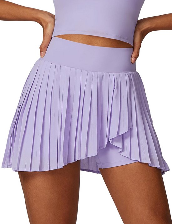 Lichtpaarse geplooide tennisrok met asymmetrische overlay en ingebouwde short.