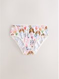Witte slip met een all-over print van Paw Patrol-personages, bloemen en hartjes.