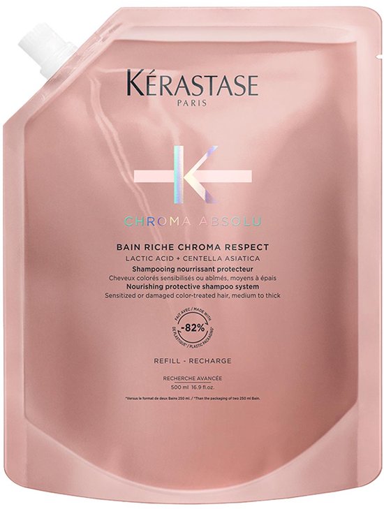 Roze Kérastase verpakking met "CHROMA ABSOLU BAIN RICHE CHROMA RESPECT" en "-82% PLASTIC"