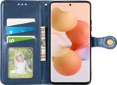 Mobigear Telefoonhoesje geschikt voor Xiaomi 12 Hoesje | Mobigear Snap Button Bookcase Portemonnee | Pasjeshouder voor 3 Pasjes | Telefoonhoesje voor Pinpas / OV Kaart / Rijbewijs - Blauw