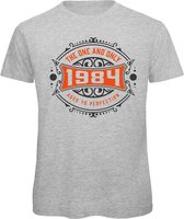 1984 The One And Only | Feest Kado T-Shirt Heren - Dames | Antraciet - Oranje | Perfect Verjaardag Cadeau Shirt | Grappige Spreuken - Zinnen - Teksten | Maat L