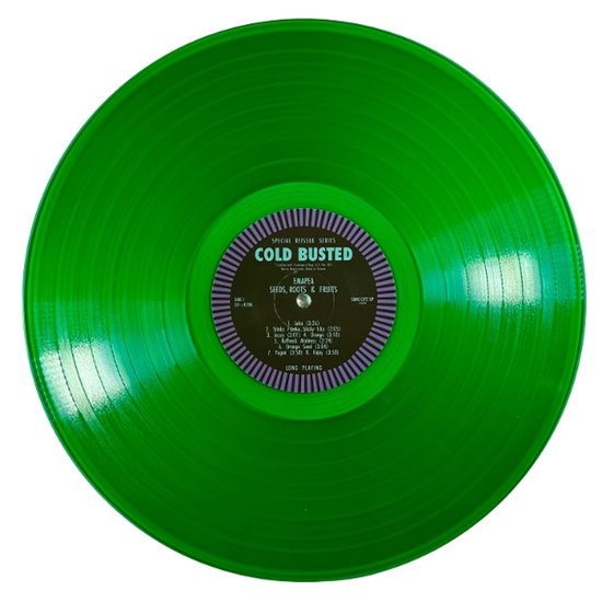 Disque vinyle vert avec label 'COLD BUSTED SEEDS, ROOTS & FRUITS'.