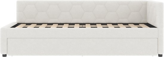 Witte slaapbank met hexagonaal patroon en houten lattenbodem, geïsoleerde weergave.
