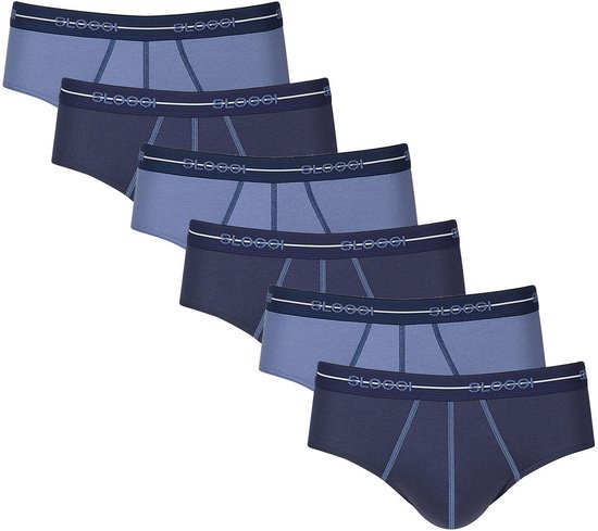 Set van zes Sloggi slips in verschillende tinten blauw met donkerblauwe tailleband met wit Sloggi logo.
