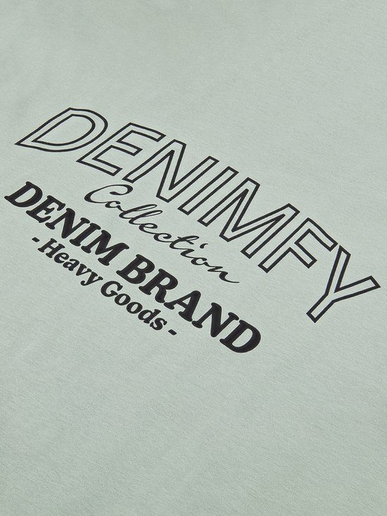 Lichtgroen T-shirt met de tekst 'DENIMFY Collection DENIM BRAND - Heavy Goods -'.