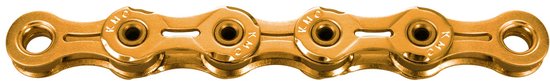 Gouden KMC fietsketting met holle pinnen en uitgesneden schakels voor gewichtsvermindering.