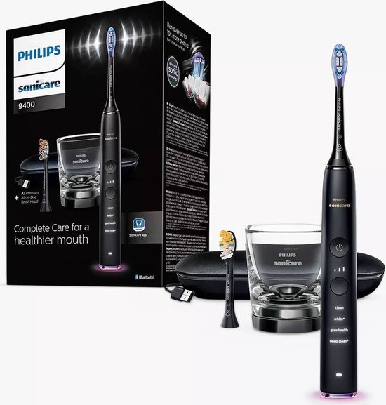 Zwarte Philips Sonicare 9400 tandenborstel met opzetborstel, oplaadglas, reisetui en verpakking met 'Complete Care for a healthier mouth'.