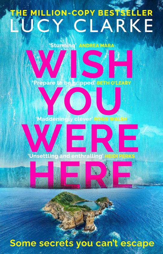 Boekomslag 'Wish You Were Here' van Lucy Clarke met een tropisch eiland in een helderblauwe oceaan.