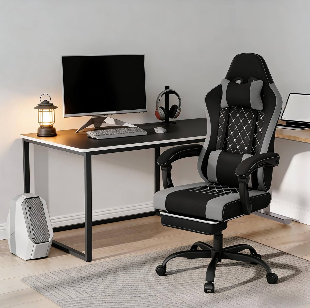 MEUNIQ Ergonomische gamingstoel met massage-lendenkussen, verstelbare hoofdsteun en kantelbare rugleuning voor werkplek en gamekamer - zwart/grijs