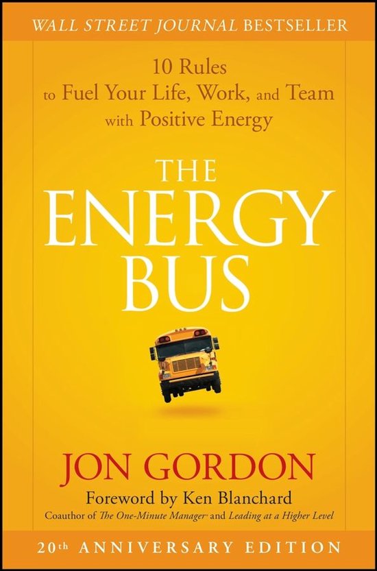 Livre "The Energy Bus" par Jon Gordon, édition 20e anniversaire, avec une couverture jaune et un bus.