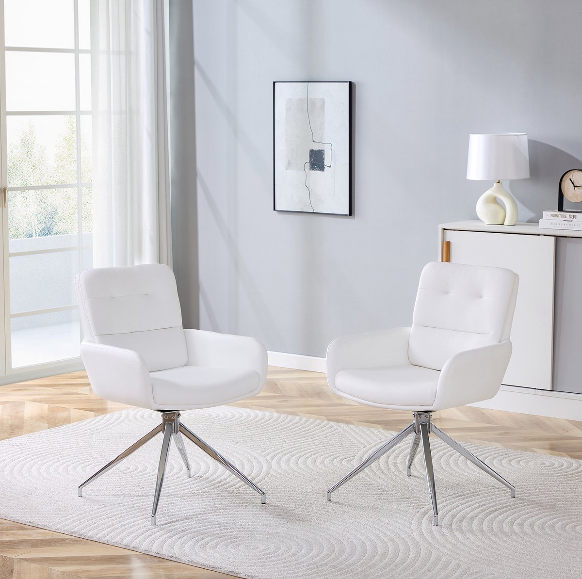 MEUNIQ Eetkamerstoelen set van 2 - 360° draaibaar met armleuningen, witte kunstleren zitting en zilverkleurig metalen onderstel - 85 cm