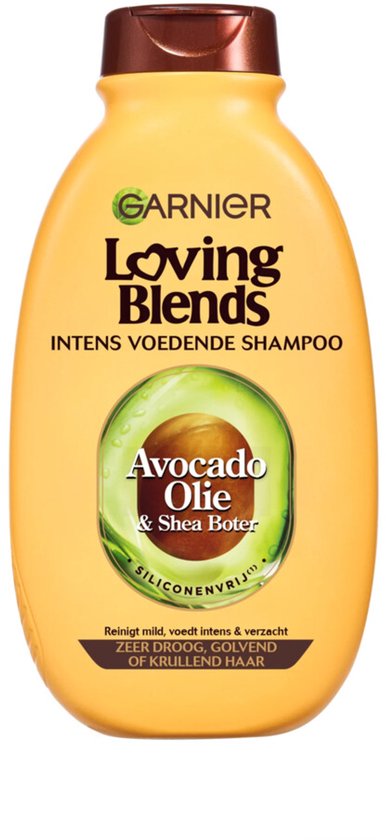Garnier Loving Blends shampoo met avocado-olie en sheaboter voor zeer droog, golvend of krullend haar in gele fles.
