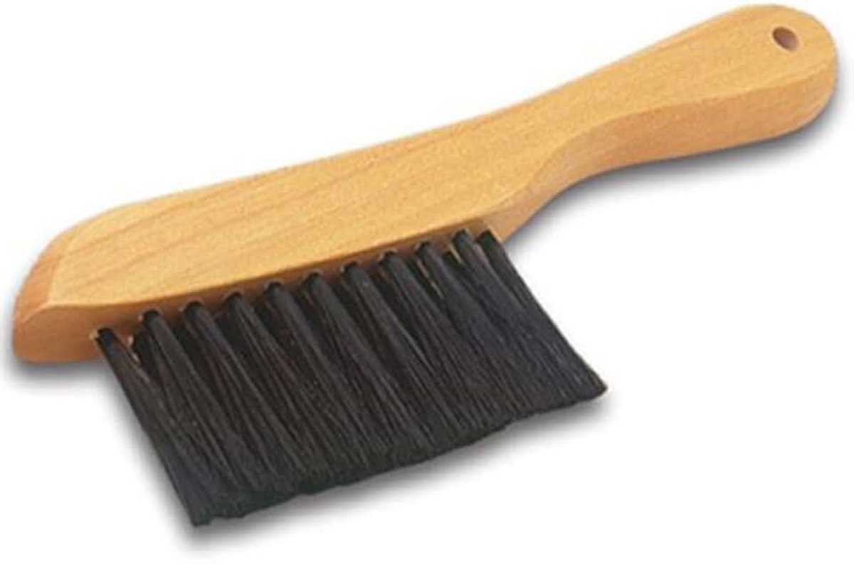 Borstel onder lint.