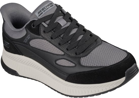 Zwarte sneaker met grijze mesh en suède, witte zool, 'BOBS SQUAD' logo op de tong.