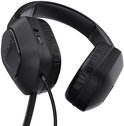 Close-up van de zwarte Trust GXT 415 Zirox gamingheadset met volumeregeling en microfoonkabel aan de zijkant.