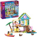 LEGO Friends strandhuis met zeehonden speelset. Blauw huis met roze accenten en groene dak. Met kajak, zeehonden en een palmboom.