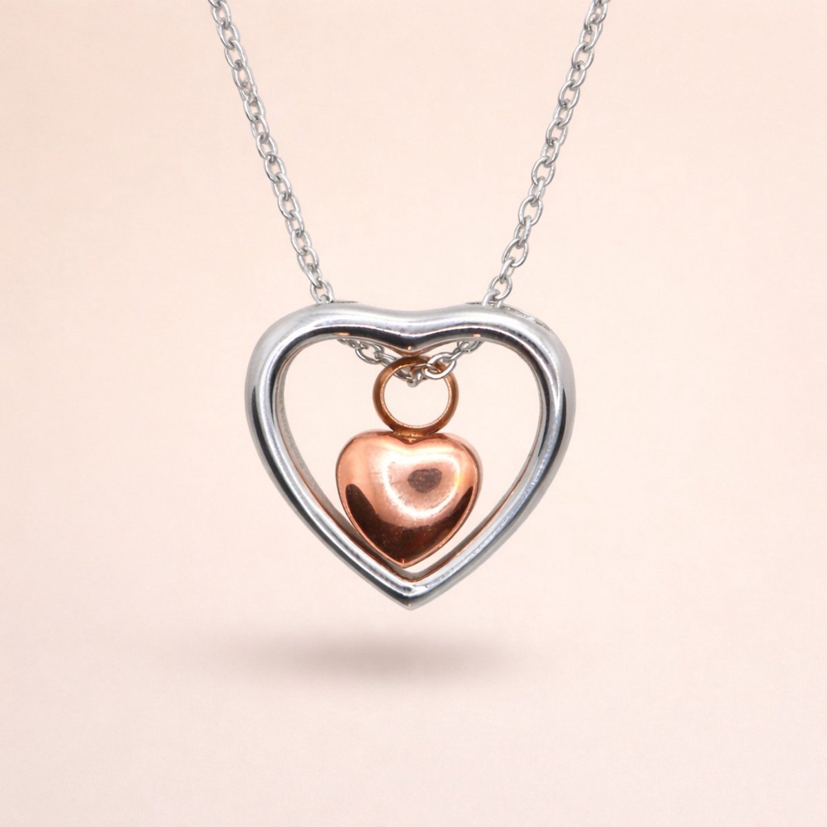 Assieraad - Ashanger met ketting en vulsetje - Mini urn - Hartje in hartje - Rosé en zilverkleurig