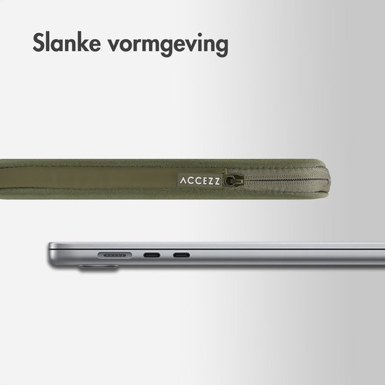 Slanke vormgeving van de groene laptoptas met Accezz logo en rits, naast een laptop.