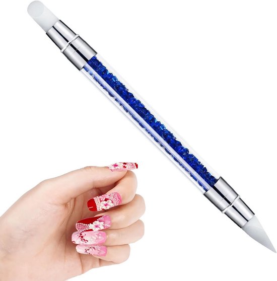 Een hand met een penseel en een penseel maakt een tekening. | Premium Foto Een hand met een penseel en een penseel maakt een tekening. | Premium Foto