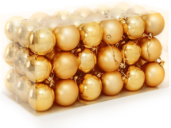 Une boîte transparente remplie de boules de Noël dorées.
